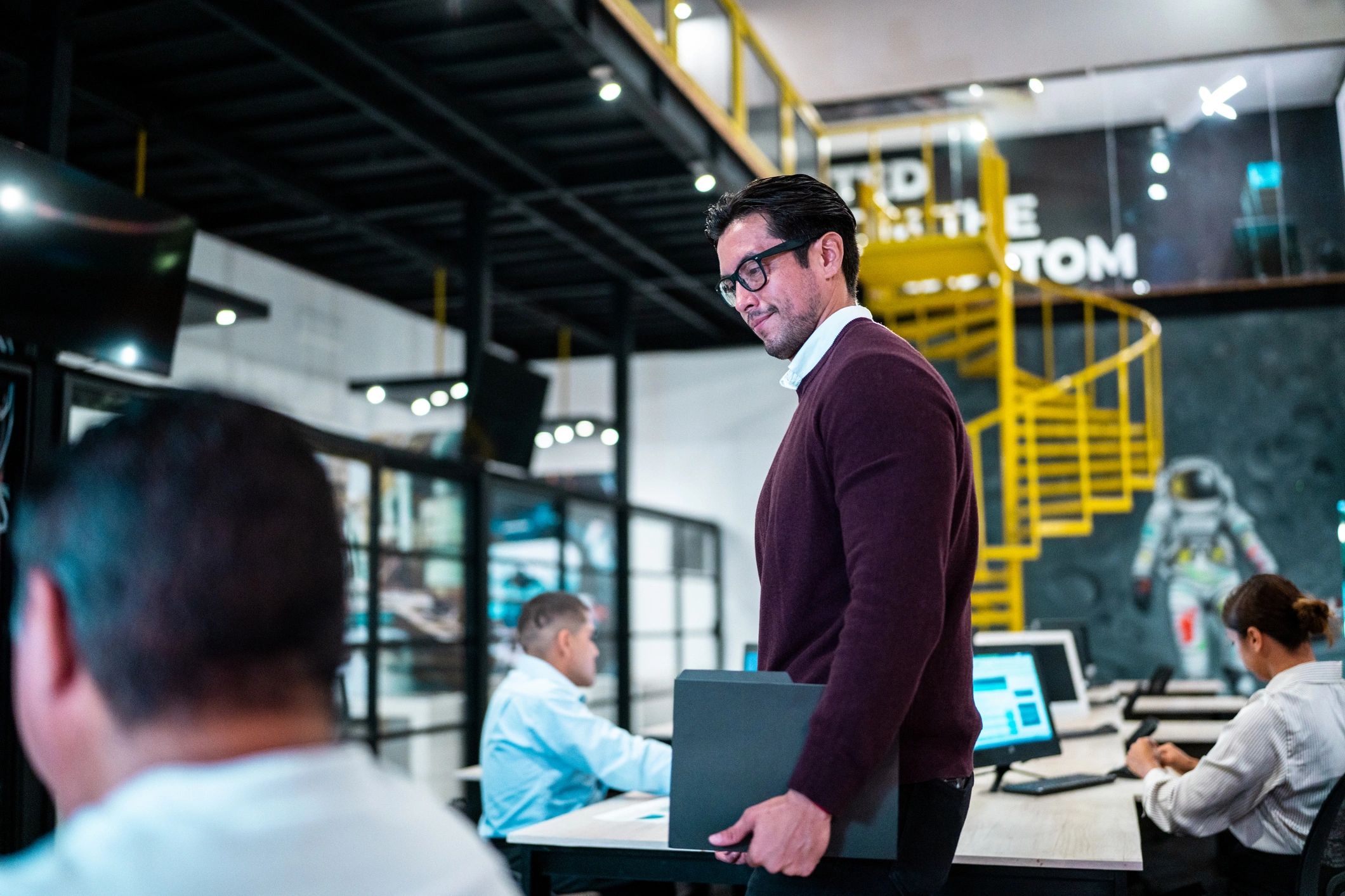 IT professional on-site in a modern office