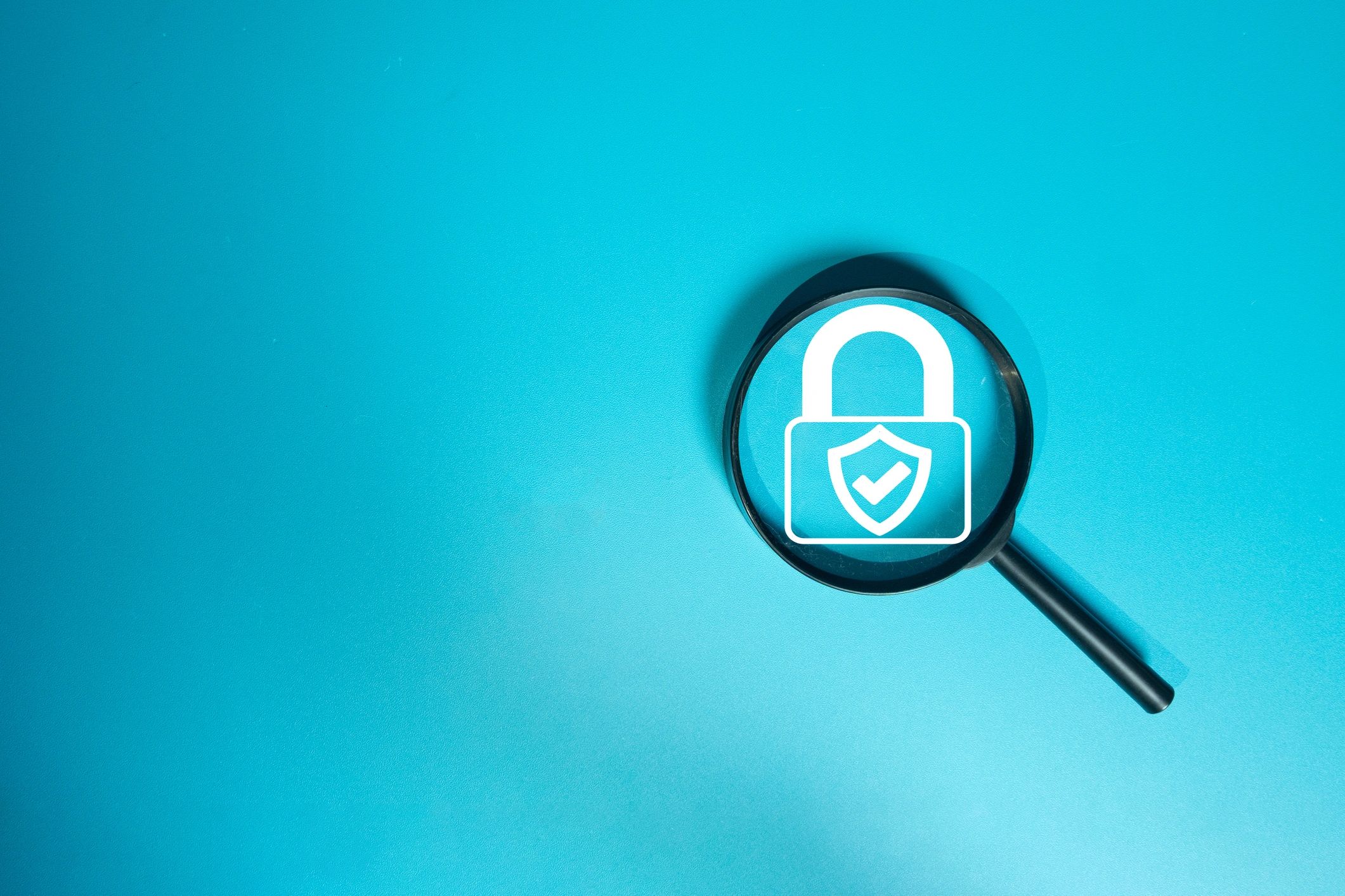 Cybersecurity audit concept with padlock icon representing protection and verification